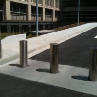On road retractable PAS68 bollards
